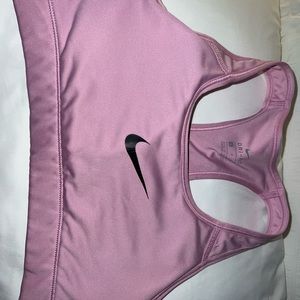 Baby pink Nike sports bra. Includes removable padding